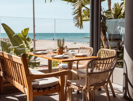 A beach and promenade in Sitges