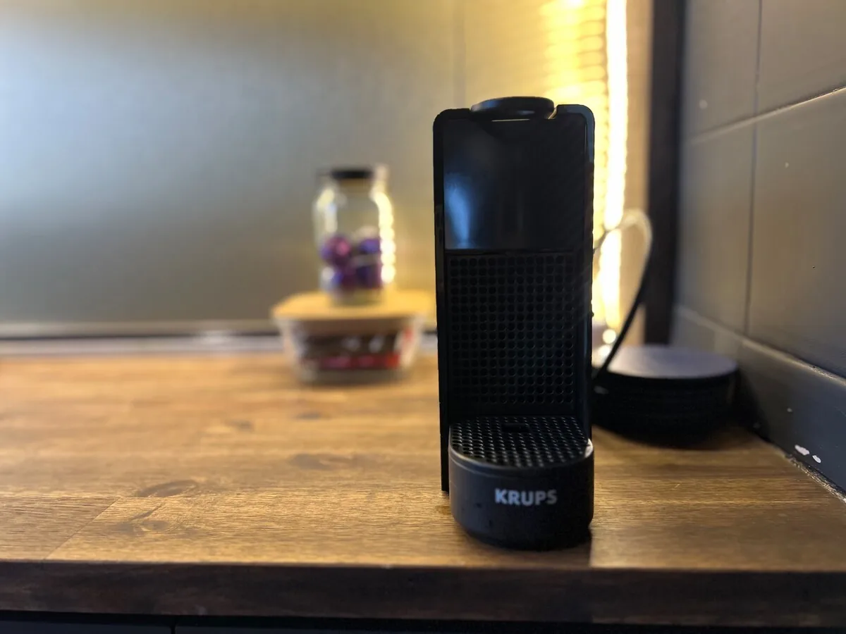 Krups Nespresso machine on the wooden kitchen worktop